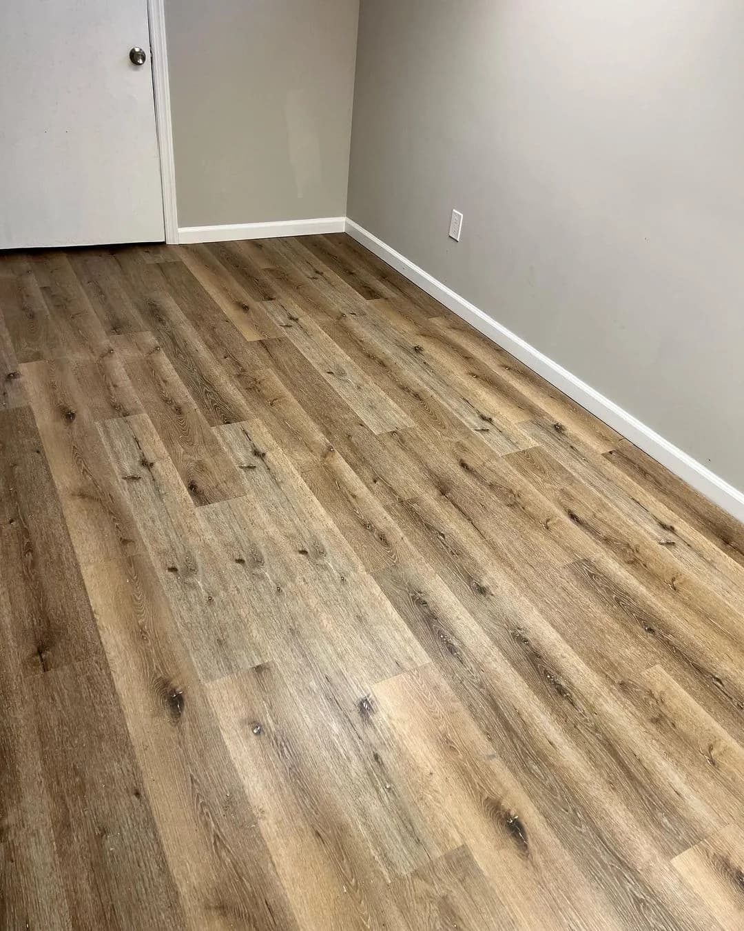 LVP flooring in an aged natural oak colorway