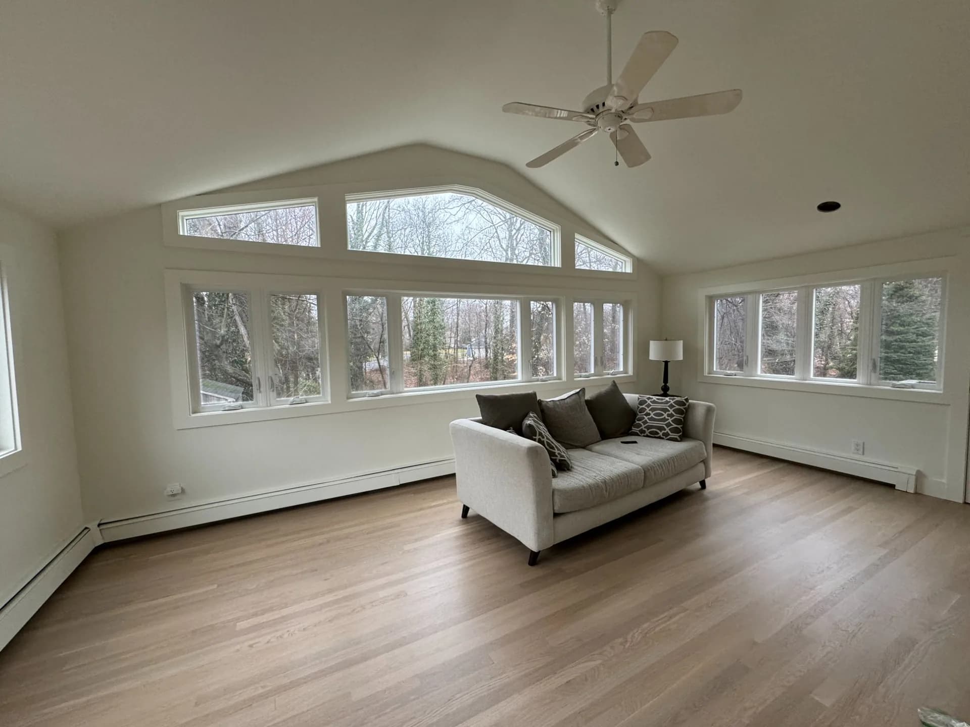 Wide-plank LVP flooring running through an open Houston living room